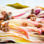 Radicchio di Treviso marinato con pinoli e uvetta