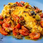 Filetti di scorfano in padella con pomodorini, acciughe e capperi