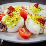 Seppie ripiene di cous cous, piselli e pecorino