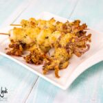 Spiedini di calamari al forno gratinati