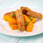 Zucca e salsiccia al forno